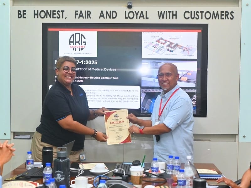 Certificate handover after the ISO 11137-1:2025 sterilization training at Grand Ten Holdings